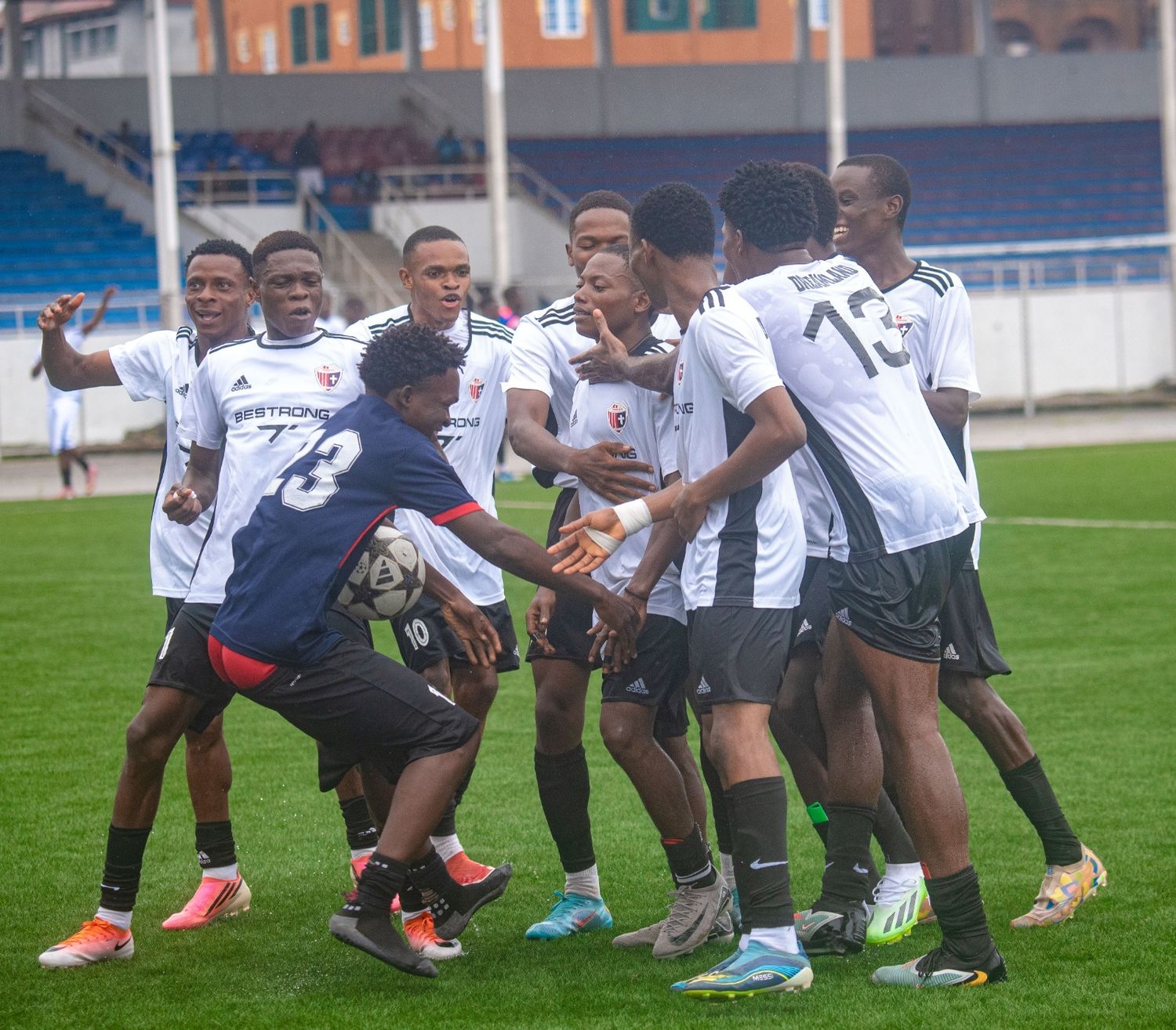 Dreamland Football Academy players celebrating