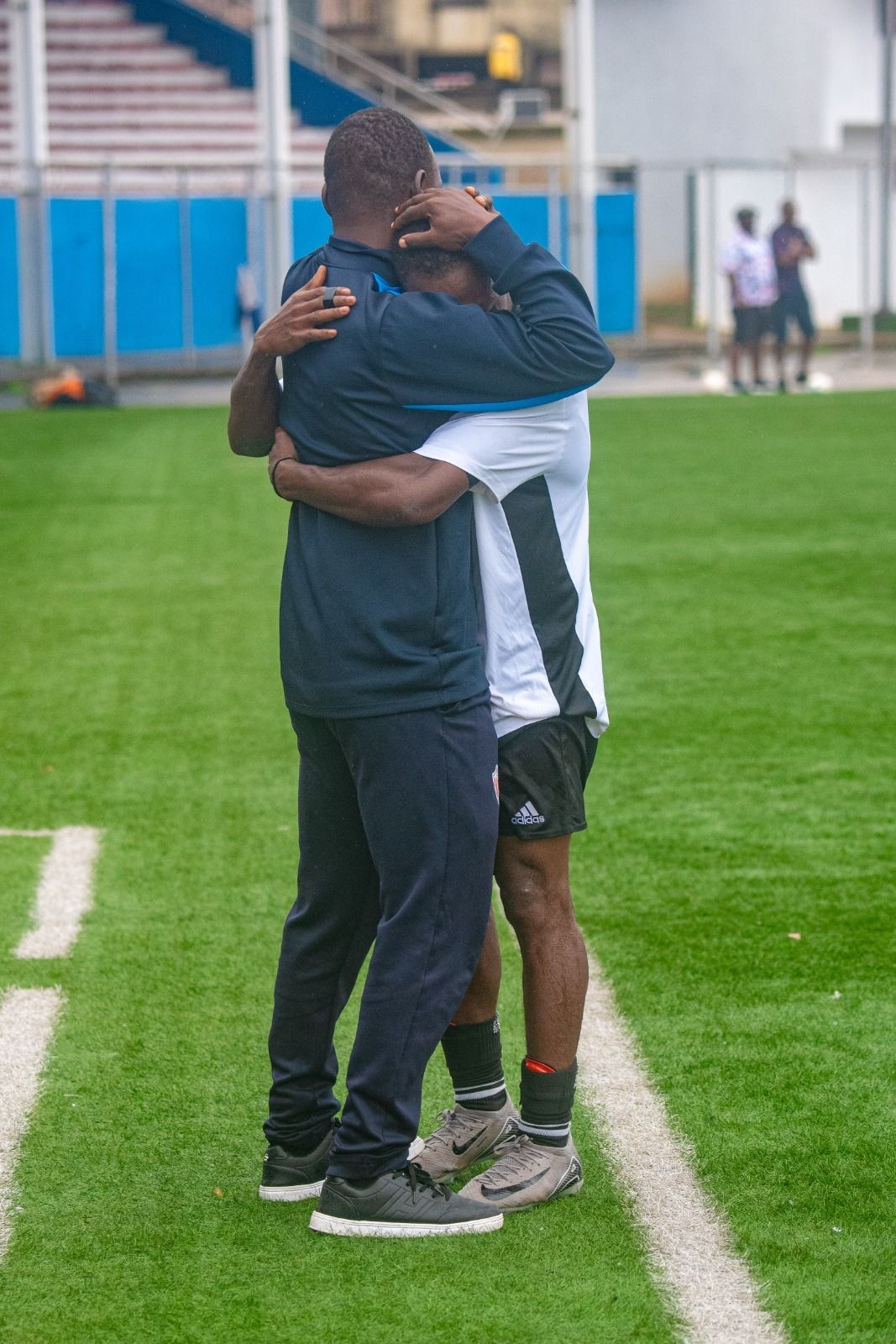 Coach and player at full time