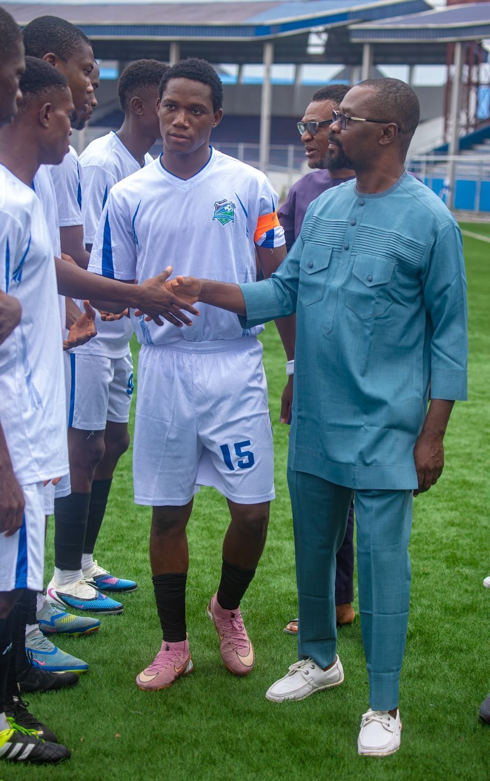 The teams are presented to the guests of honour