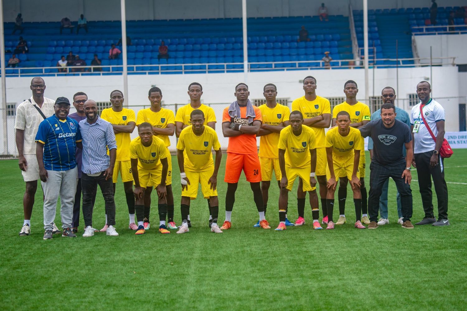 Teams and officials line up for the closing ceremony